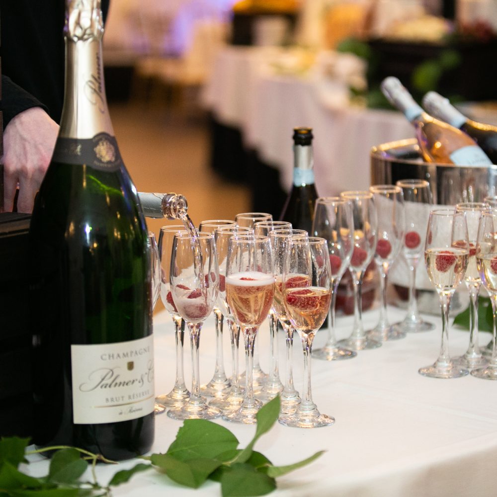A table of various glasses of champagne