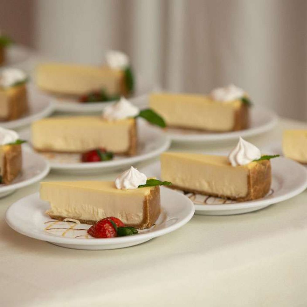 Plates of pieces of cheesecake